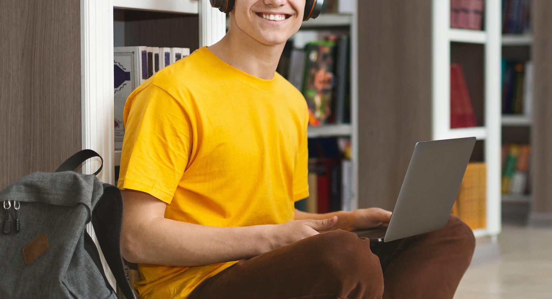 portrait of cheerful student working on new projec ax2utls.jpg